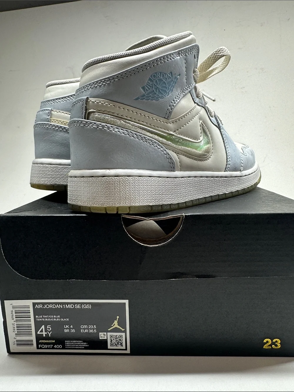 Air Jordan Kids Mid-Top Sneakers in White and Light Blue with Iridescent Swoosh